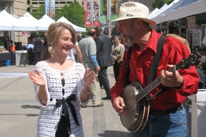 Katherine Tallmadge, SOC/MA '94, having fun at Capital Harvest on the Plaza farmer's market.